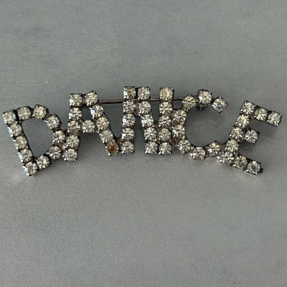 Vintage Rhinestone “Dance” Brooch, Set in Silvertone